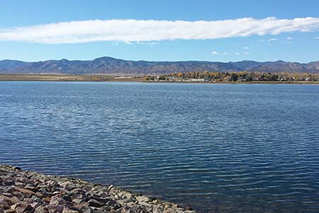 Scenic view of South Platte Reservoir, blue water with mountains in the background